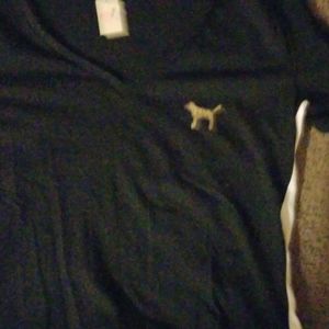 VS black V neck tshirt. Gold bling.
